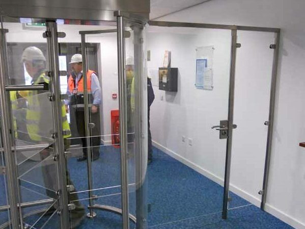 Full height internal glass turnstile with wide DDA pedestrian gate