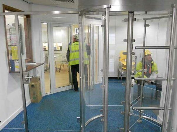 Full height internal glass turnstile with wide DDA pedestrian gate