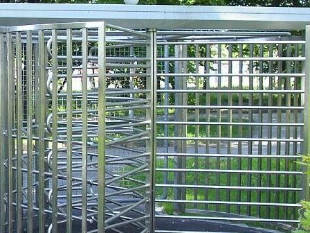 Extra wide full height external turnstiles with canopy