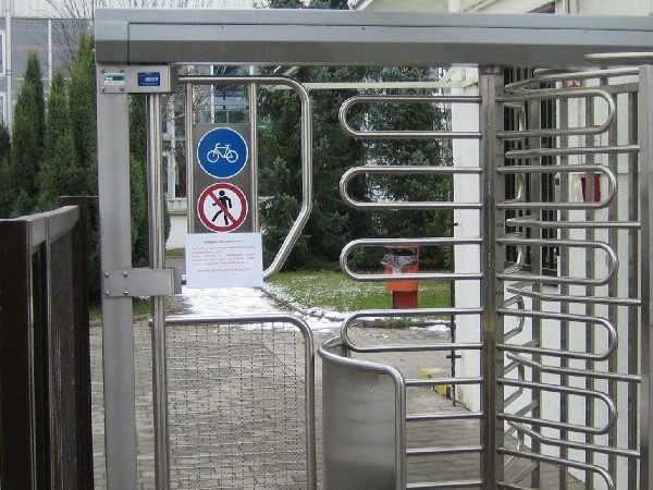 Full height external turnstiles with canopy and bicycle access gate