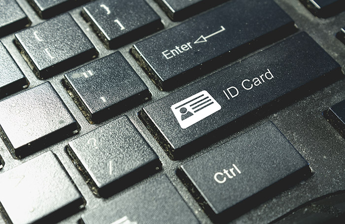 Close-up image of a keyboard with "ID Card" button